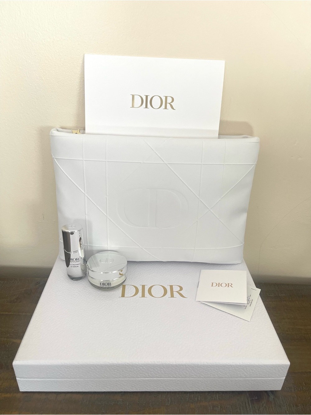 Dior White Embossed Leather Cosmetic Pouch with serum and day cream